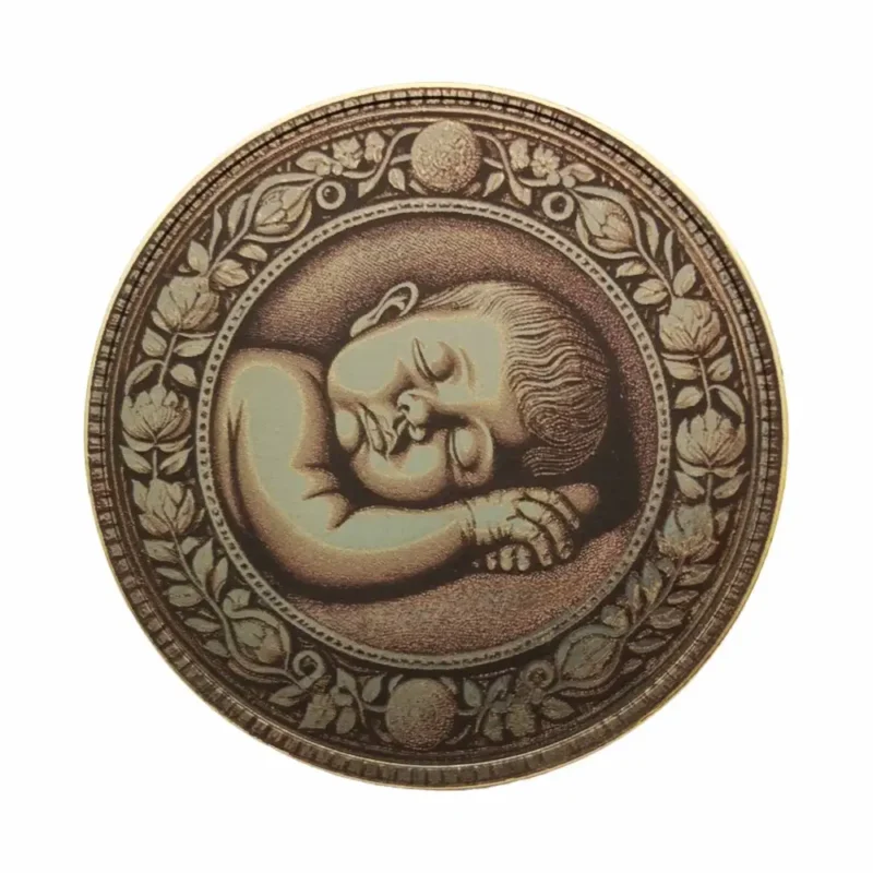 Rückseite der Geburtsmünze mit festem Babymotiv – schlafendes Baby mit floraler Umrandung