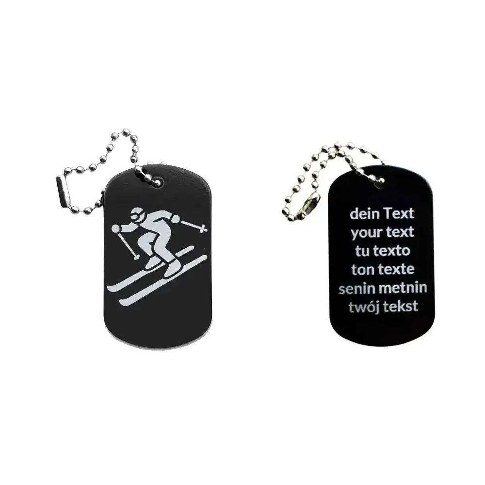 Dogtag mit Skifahrermotiv, daneben Beispiel eines personalisierten Textes