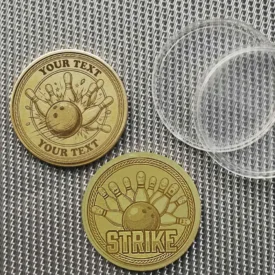 Rückseite der Bowling-Münze mit Strike-Schriftzug und Pins.